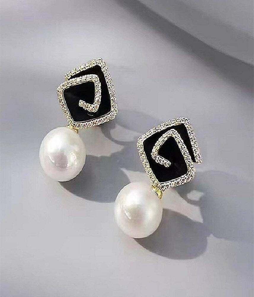AMERICAN DIAMOND STONE GOLD EARRINGS